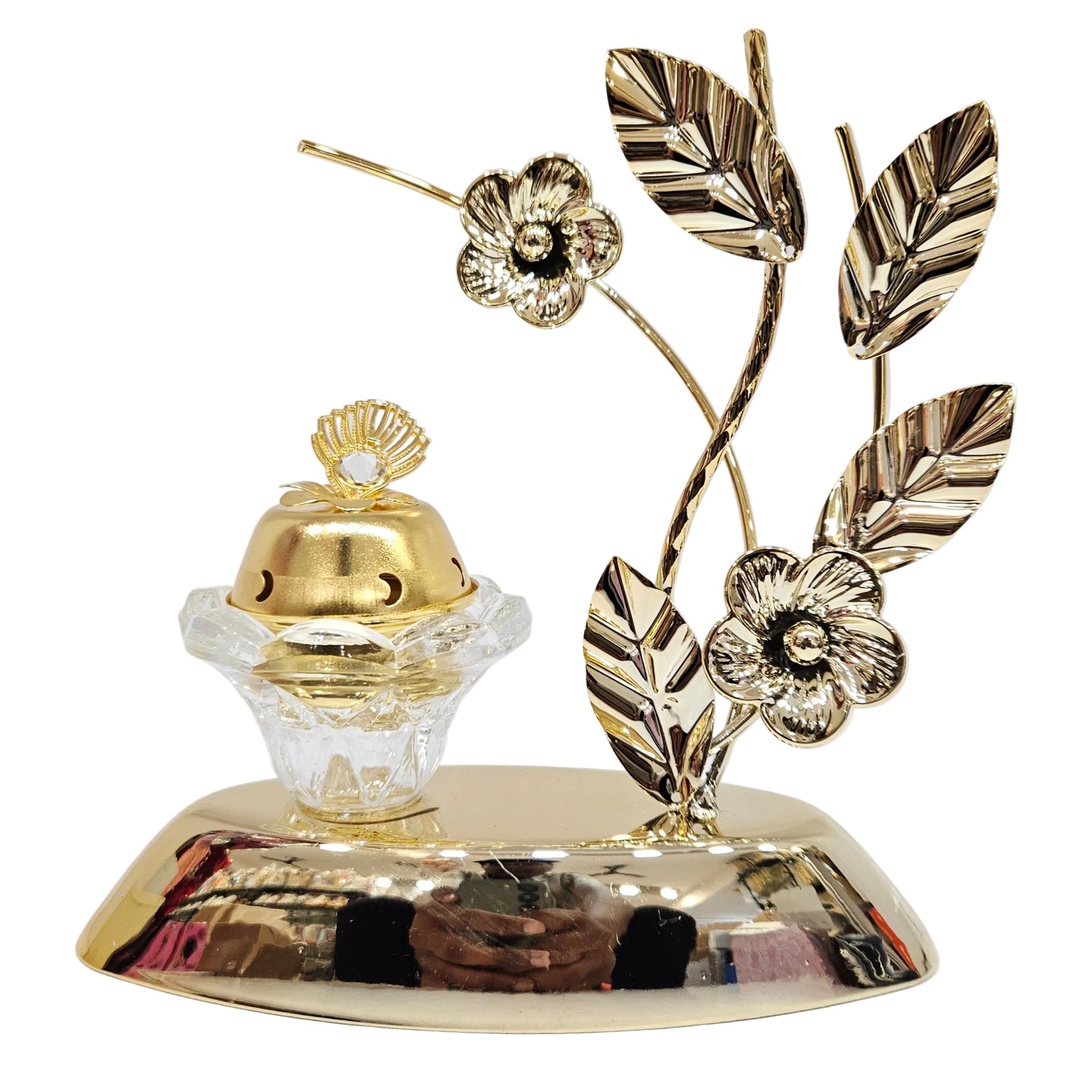 Gold-toned metal showpiece features floral and leaf designs and a glass base for a candle or incense burner