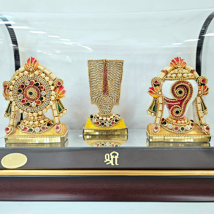 Shank Chakra Tilak 24carats gold Plated idol Decorated with attractive stones designed in a transparent protective cabin