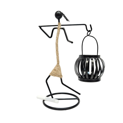 Decorative abstract character candle holder figurine made of black iron