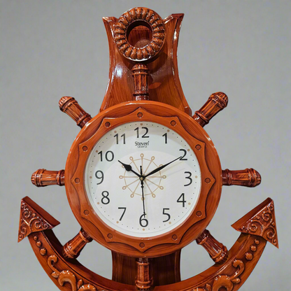 Wooden ship's wheel clock with decorative design on a dark background