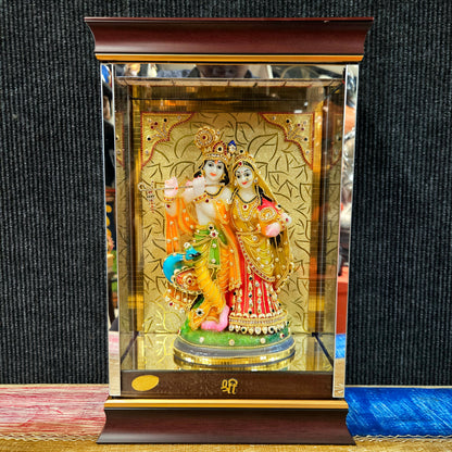 24 carat gold Plated radha Krishna Idol Statue Decorated with attractive stones design transparent protective cabin