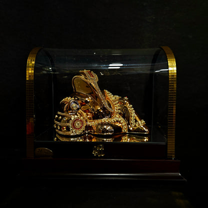 24 carat gold Plated resting position vinayaka idol with stone designer,transparent protective cabin