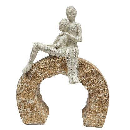 Decorative showpiece love Couple textured figure perched a top a textured, arched base