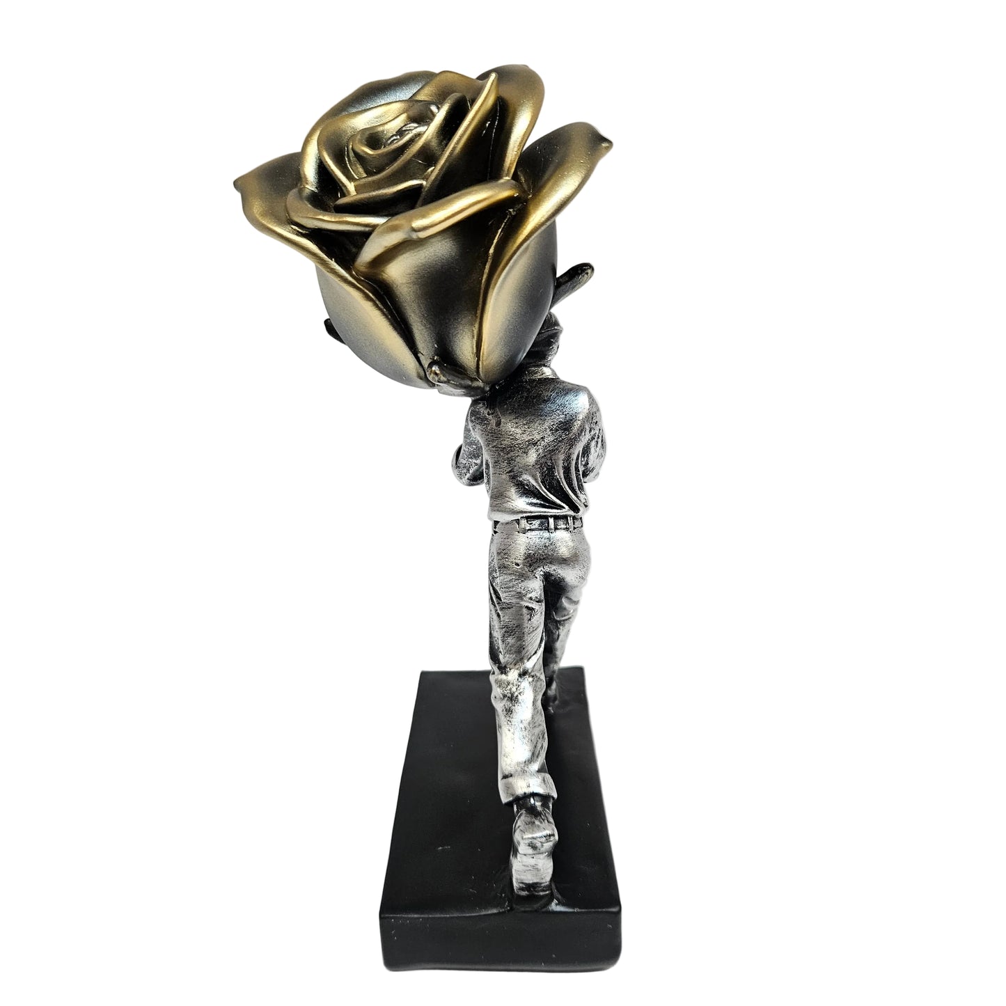 Metallic polyresin figurine depicts a male figure in mid-stride carrying an oversized golden-and-black rose over his shoulder, symbolizing labor, love, or determination