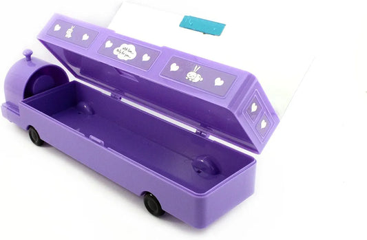 Purple pencil box shaped like a train or bus, designed for children. Additional detaIt has wheels, possibly for play.
The box features cartoon-like graphics with the word "SAUCE" visible.
It includes compartments and may have a built-in sharpener.