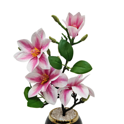 Artificial pink magnolia flower stems used for home decoration