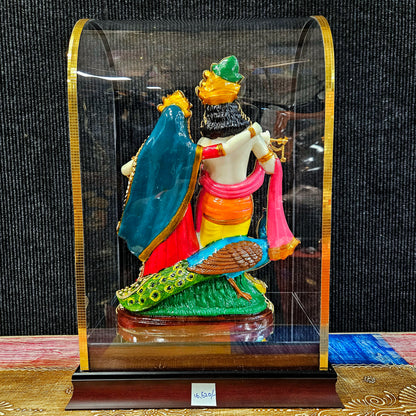 24carat gold Plated attractive Krishna Idol Decorated with stones in a transparent protective cabin