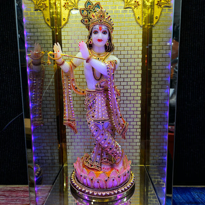 24carats gold Plated Krishna Statue idol Decorated with attractive stones in a transparent protective cabin