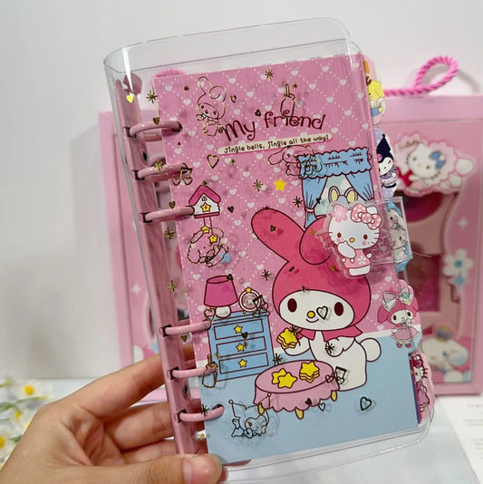 My Friend Jingle bells, jingle all the way!" appears on a notebook featuring a character resembling My Melody from Sanrio.