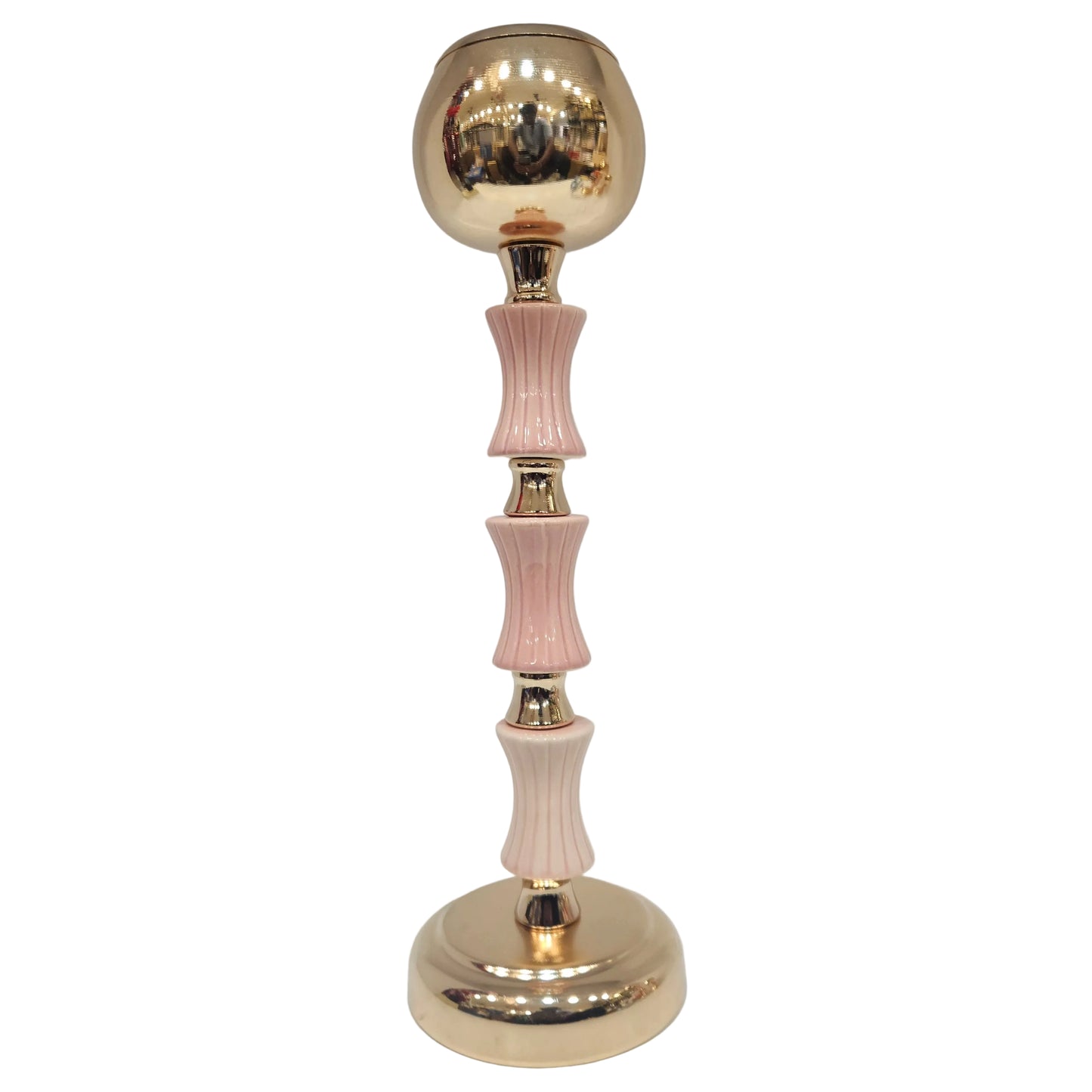 Gold and pink decorative candle holders feature a classic polished finish and are designed to securely hold tea lights