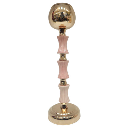 Gold and pink decorative candle holders feature a classic polished finish and are designed to securely hold tea lights