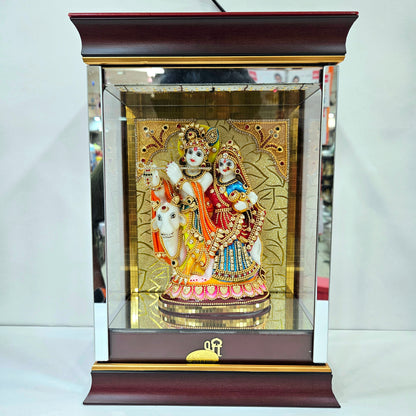 Radha Krishna attractive stones designed 24 carats gold Plated idol Statue showpiece in a transparent protective cabin