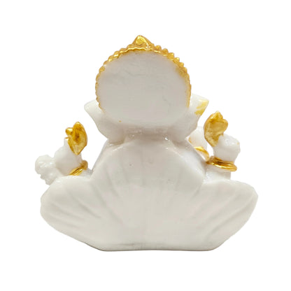 White resin Ganesha idol with a golden crown and accents god Idol