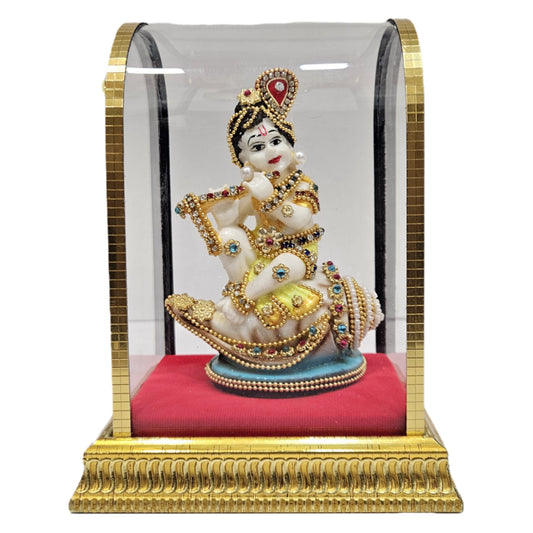 Handcrafted Baby Krishna "Makhan Chor" idol made of polyresin and enclosed in a glass display cabin case