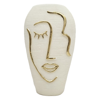 White, textured ceramic vase features a minimalist, golden line-art human face design