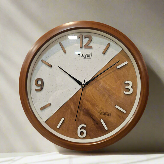 Wooden wall clock with a two-tone design on a dark background