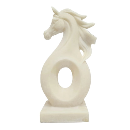 This white polyresin horse sculpture is designed with a minimalist, abstract aesthetic featuring a flowing mane and a circular opening in the center