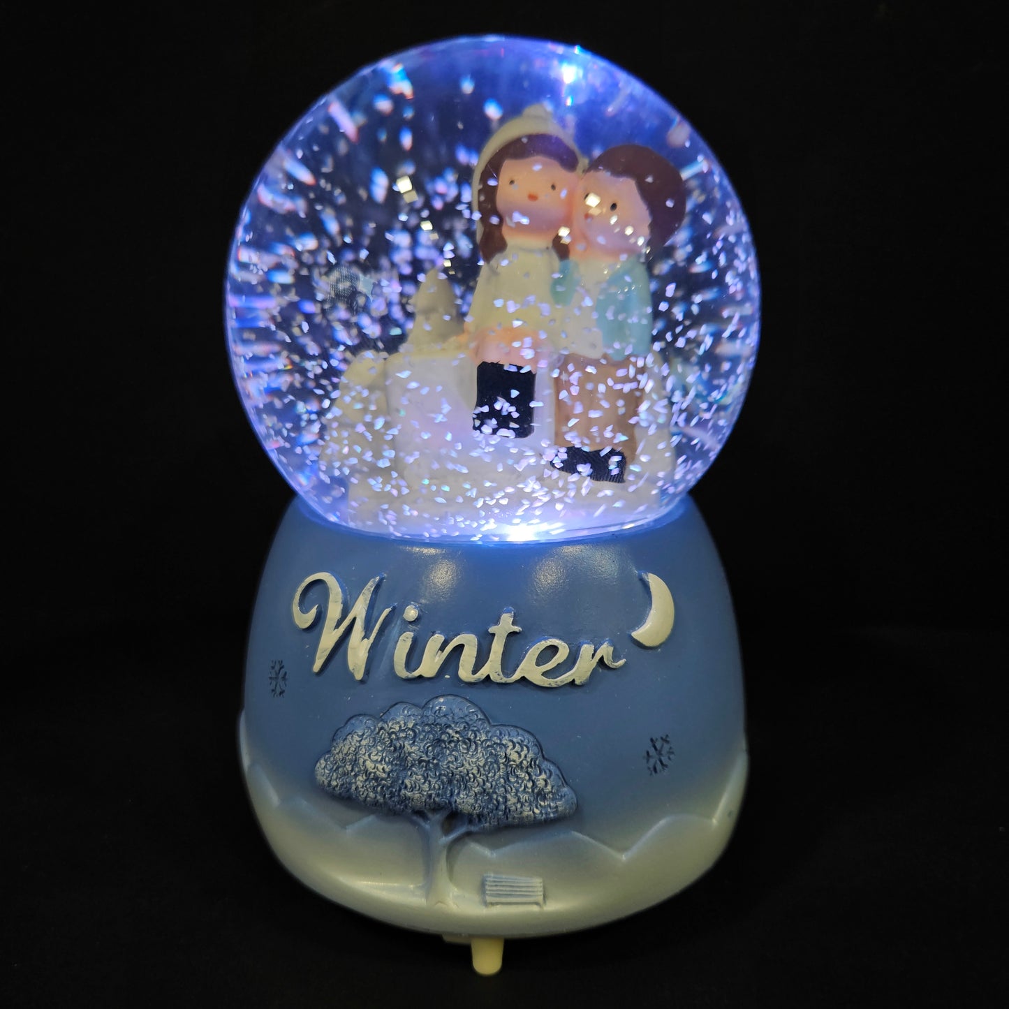 Beautiful love Couple with winter themed multi colour lighting snow Globe