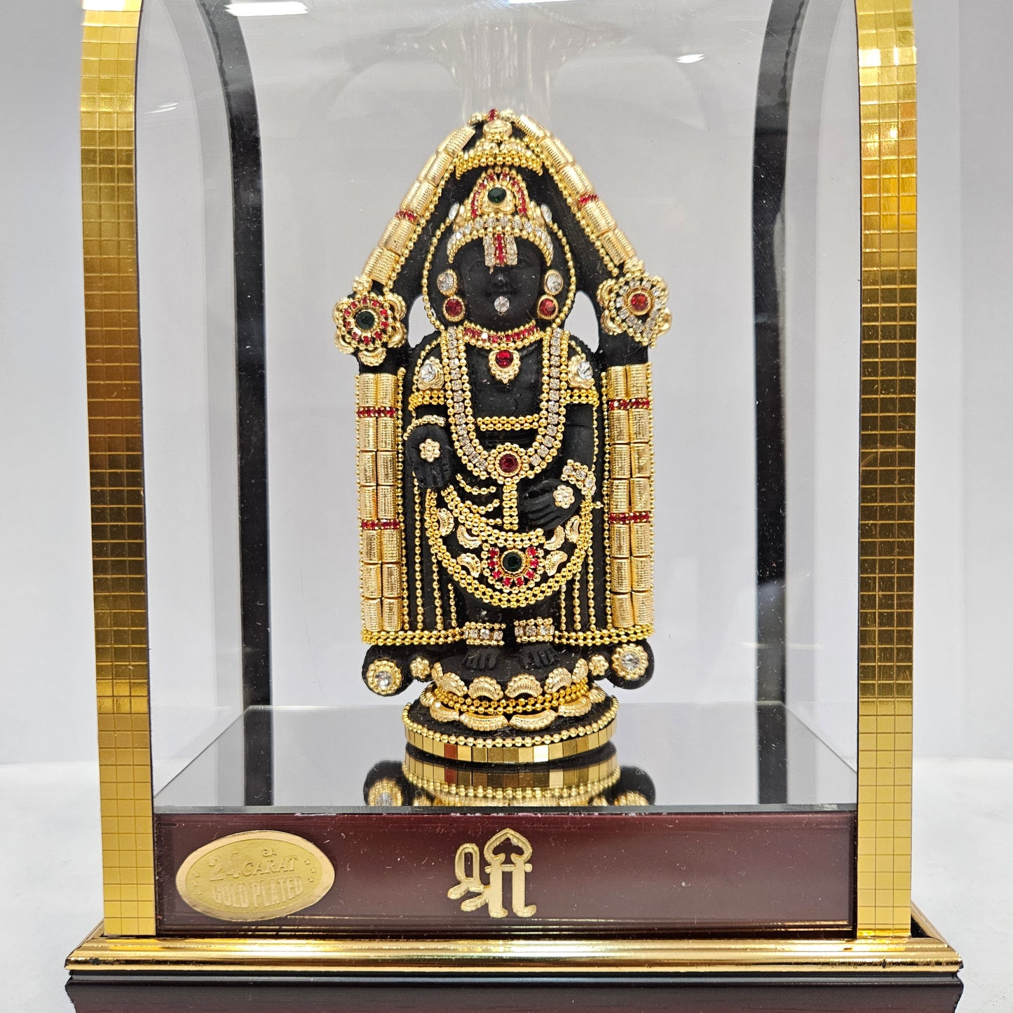 24 carats gold Plated Balaji Idol Statue Decorated with attractive stones designed in a transparent protective cabin