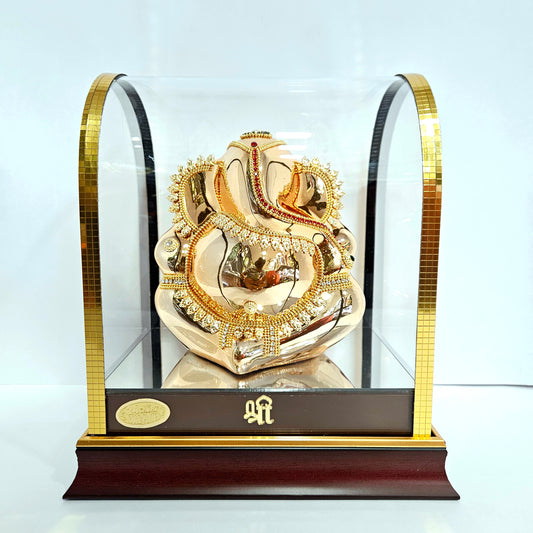 Ganesh Idol Elegant Home Decor for Pooja Room, Mandir, Temple Dashboard. Ideal Gift for Spiritual Enrichment Statue Showpiece in a transparent protective cabin