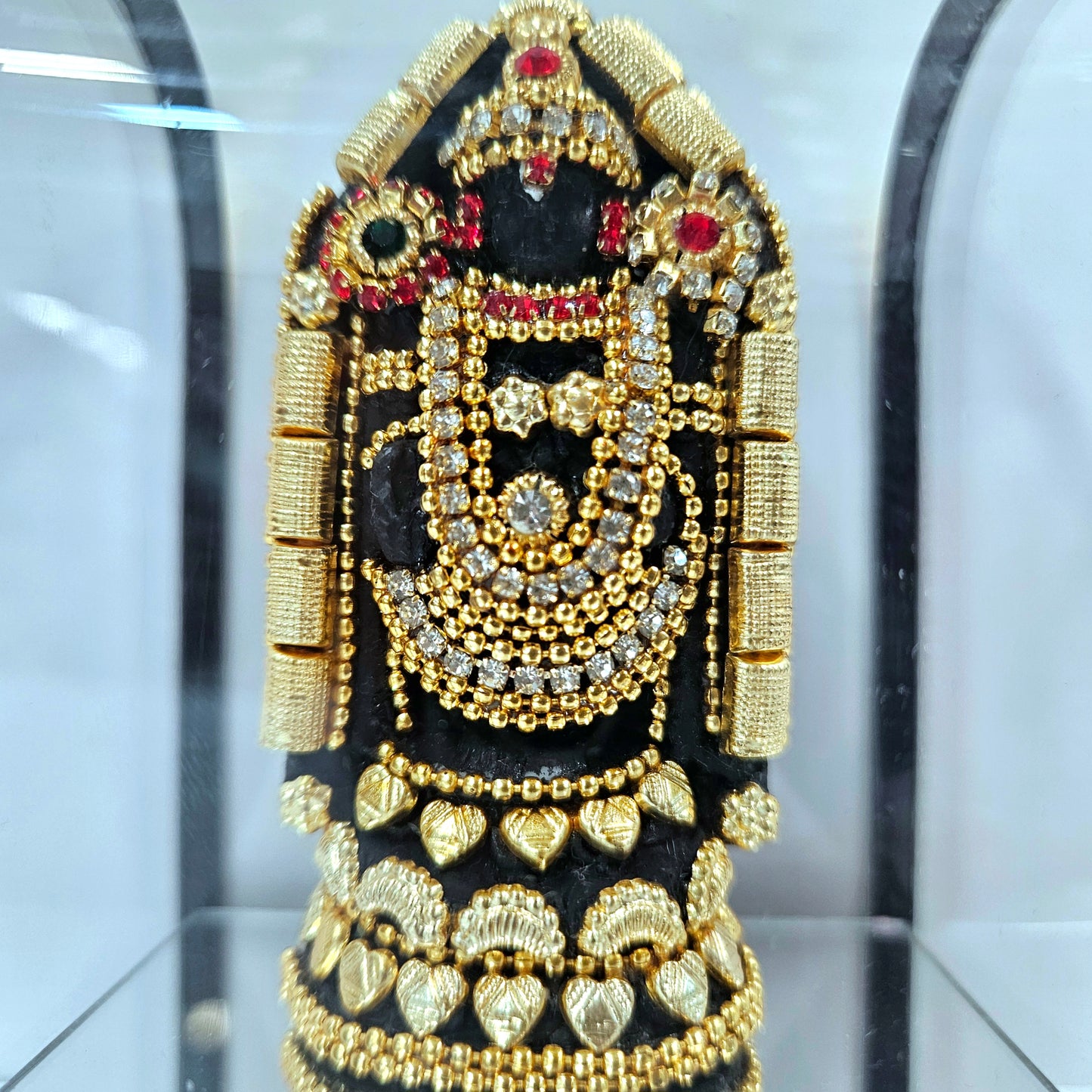 24 carats gold Plated Lord Balaji decorated with stones in transparent protective cabin