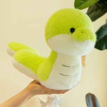 Plush toy snake held in a hand with a light background