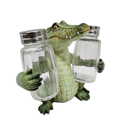 Decorative salt and pepper shaker set featuring a green alligator figurine for Dining table decor