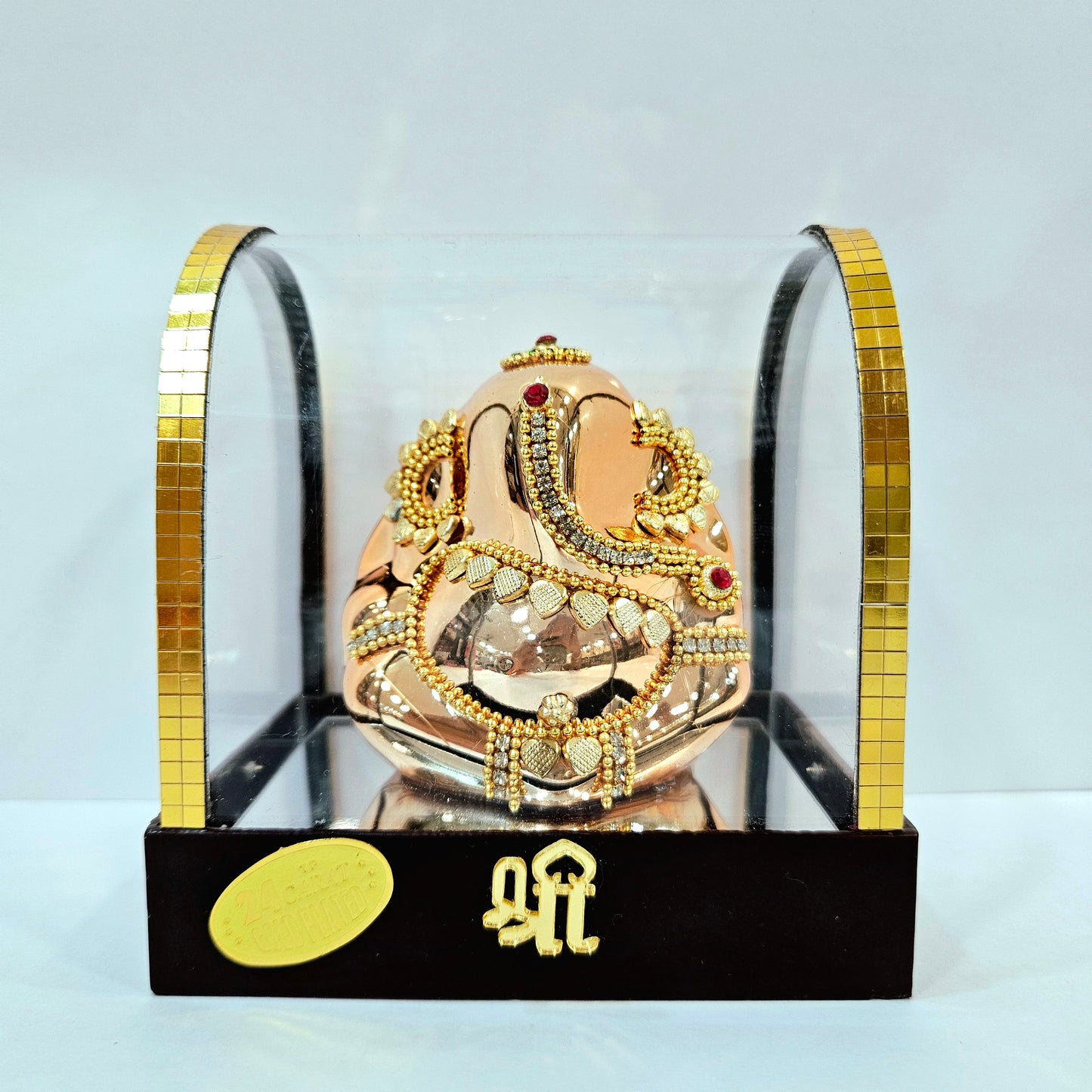 24carats gold Plated vinayaka idol Statue Decorated with attractive stones in transparent protective cabin