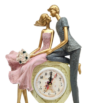 Love couple showpiece features a resin figurine of a kissing couple with a Paris-themed heart clock