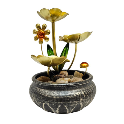 Lotus Tabletop Fountain features a gold-finished metal design with a waterfall and decorative rocks