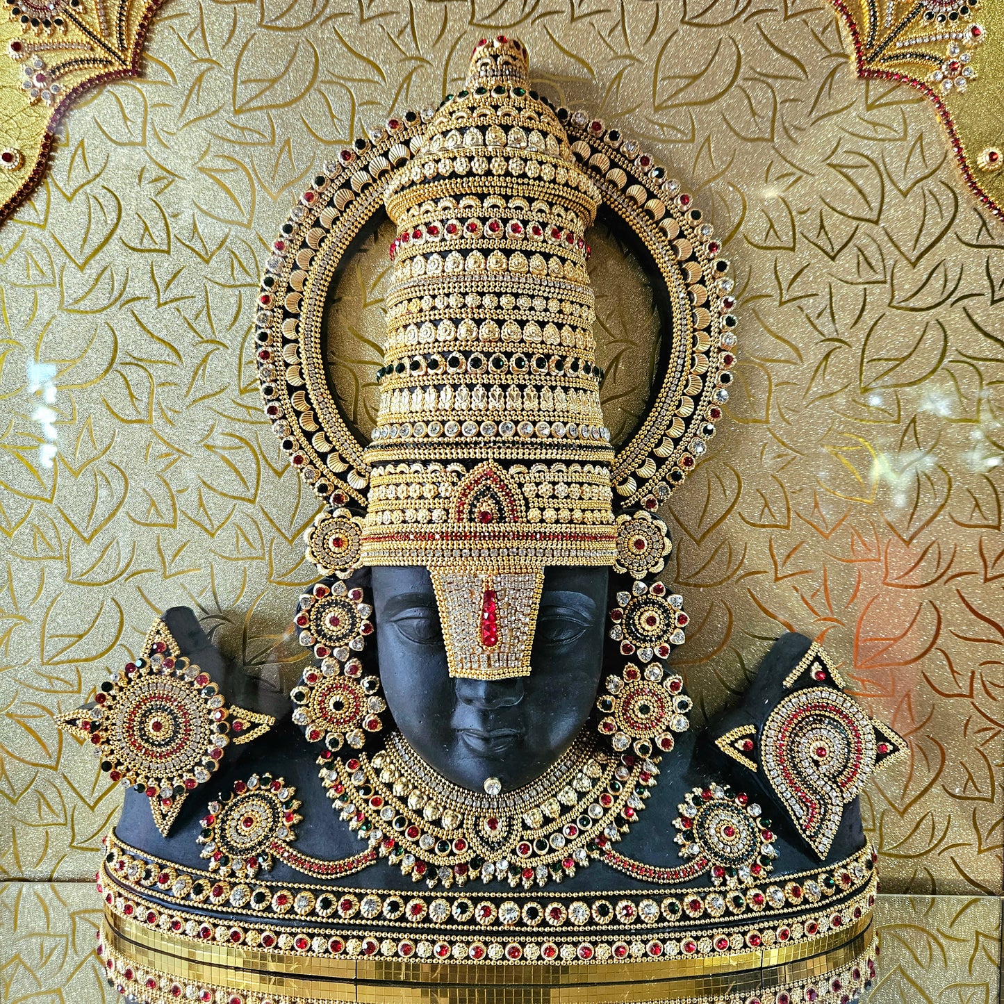 Shank Chakra Balaji 24carats gold Plated idol Statue Decorated with attractive stones in a transparent protective cabin