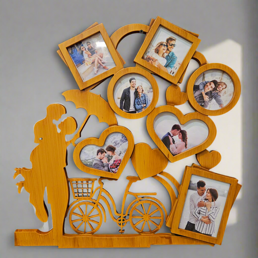 Wooden photo frame with heart and bicycle design holding family photos on a dark background