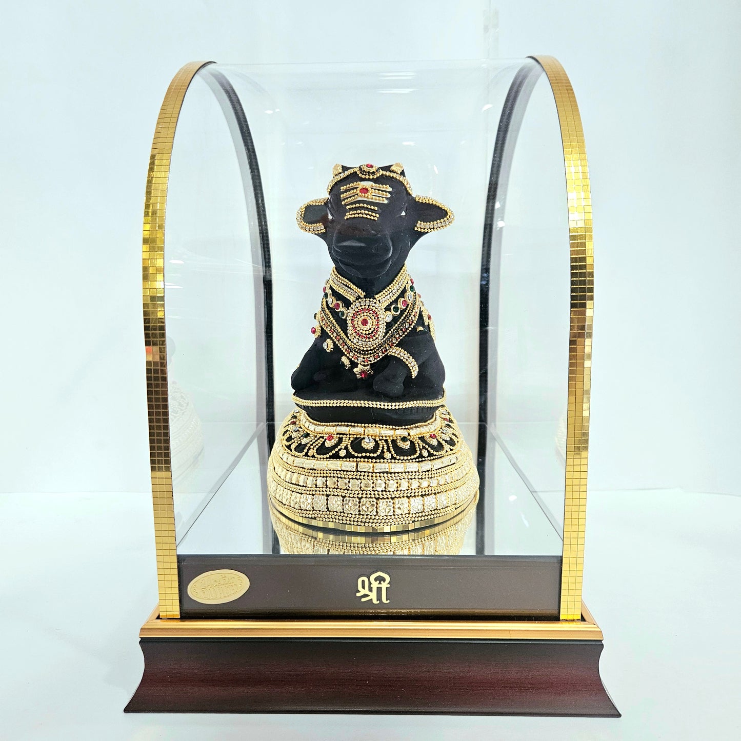 24 carats gold Plated Nandi statue idol Decorated with attractive stones in a transparent protective cabin