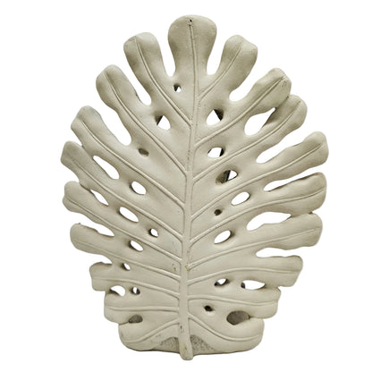 Sima-Land polyresin candle holder features a woman in a lotus pose against a monstera leaf