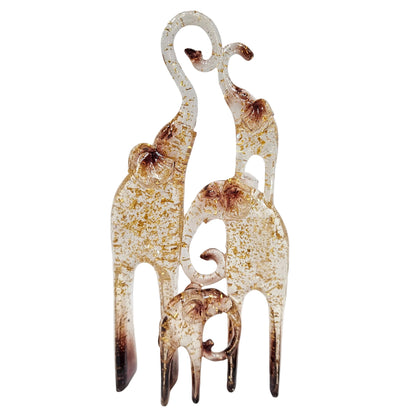 Glass sculpture of a four family elephants detailed with gold leaf flakes and brown tips Showpiece Figurine