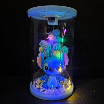 Stitch cartoon character Figurine in a capsule with lighting perfect for couple gifting
