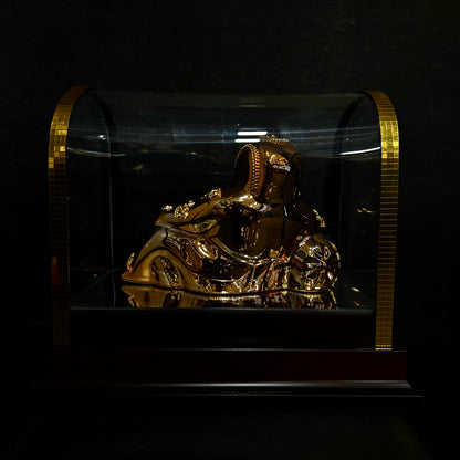 24 carat gold Plated resting position vinayaka idol with stone designer,transparent protective cabin