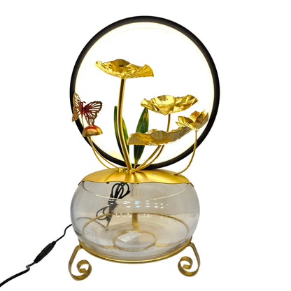 Golden lotus tabletop water fountain features a glass bowl base and a circular LED light ring