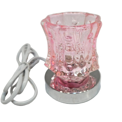 Electric fragrance oil lamp and wax melt warmer. It serves as both an aromatherapy diffuser and an accent nightlight