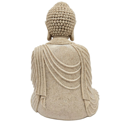 This sand-finished Buddha showpiece is crafted from durable polyresin and features a serene meditation pose