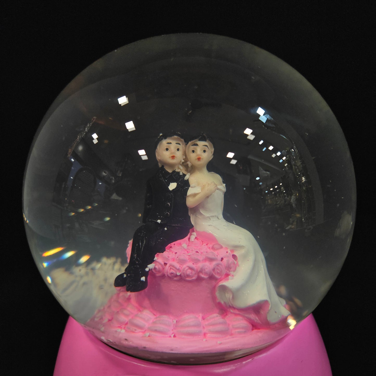 Cute Good looking married couple in a glass dom with Music & multi colour lighting snow Globe