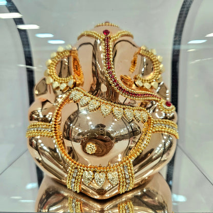 Lord vinayaka murti 24carats gold Plated idol Statue in a transparent protective cabin