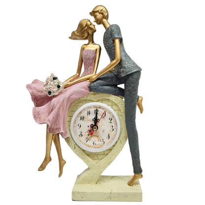 Love couple showpiece features a resin figurine of a kissing couple with a Paris-themed heart clock
